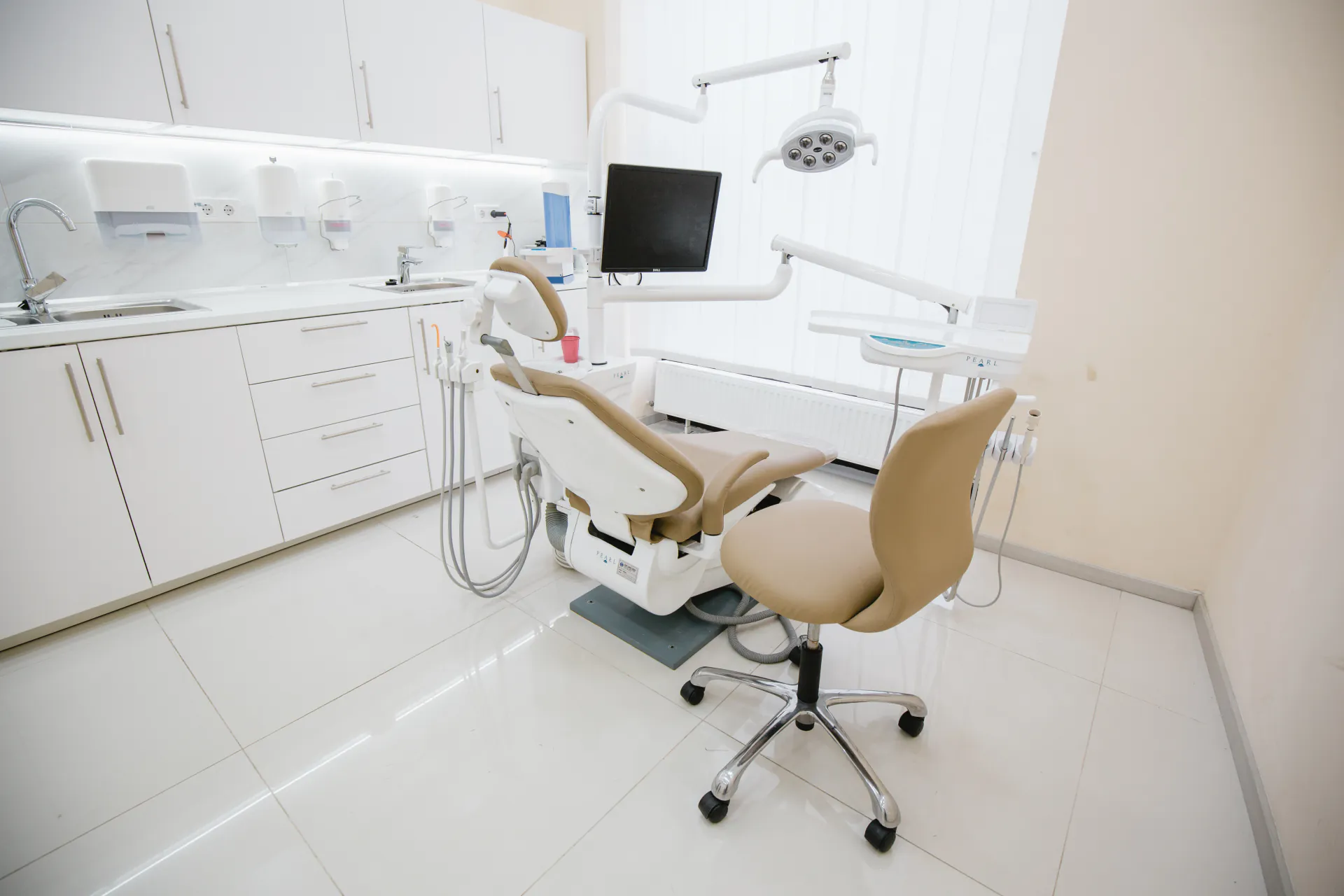 Modern Budapest clinic treatment room prepared for implant and restorative care